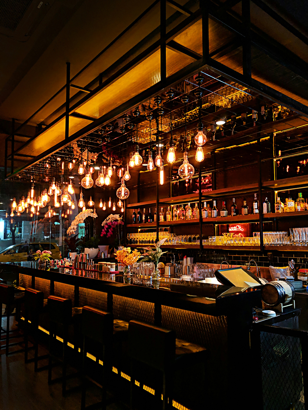 View of bar seating at night in South Congress Austin