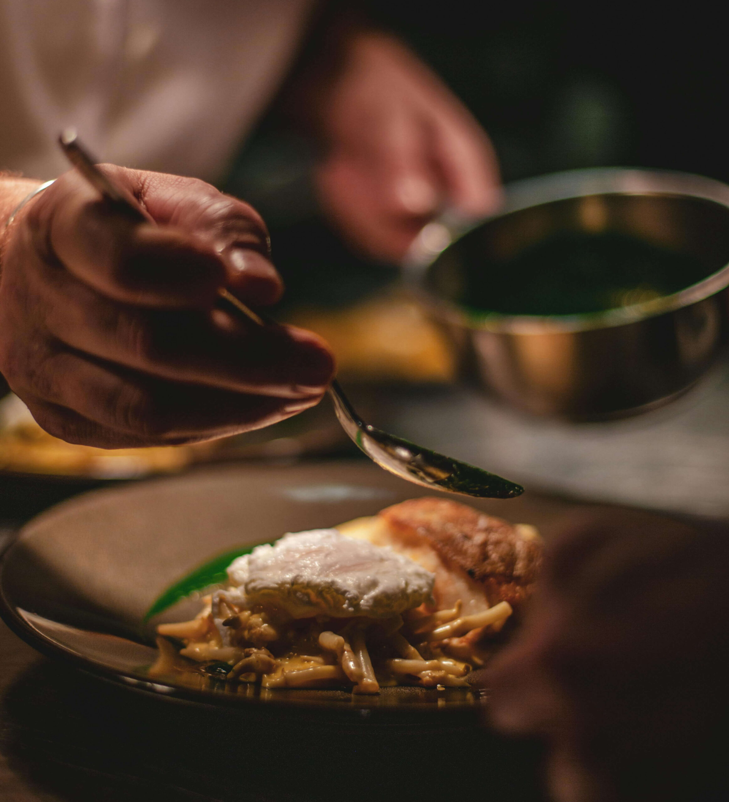 Chef plating dinner at a South Congress Austin restaurant